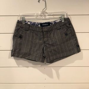 Billabong plaid shorts with pockets & cuffs.